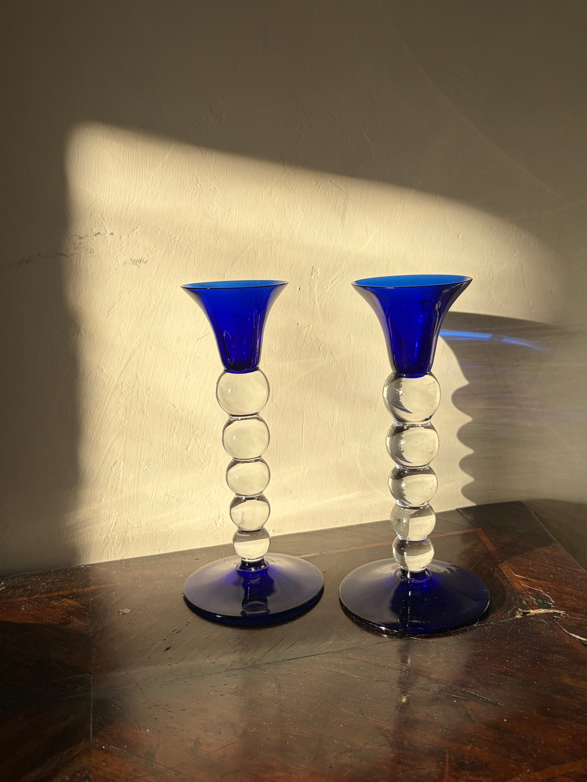 Paire de flambeaux en verre