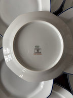 12 assiettes à dessert en porcelaine de Limoges