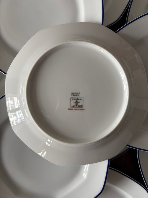 12 assiettes à dessert en porcelaine de Limoges